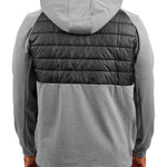 Man wearing black quilted jacket from Black Clover