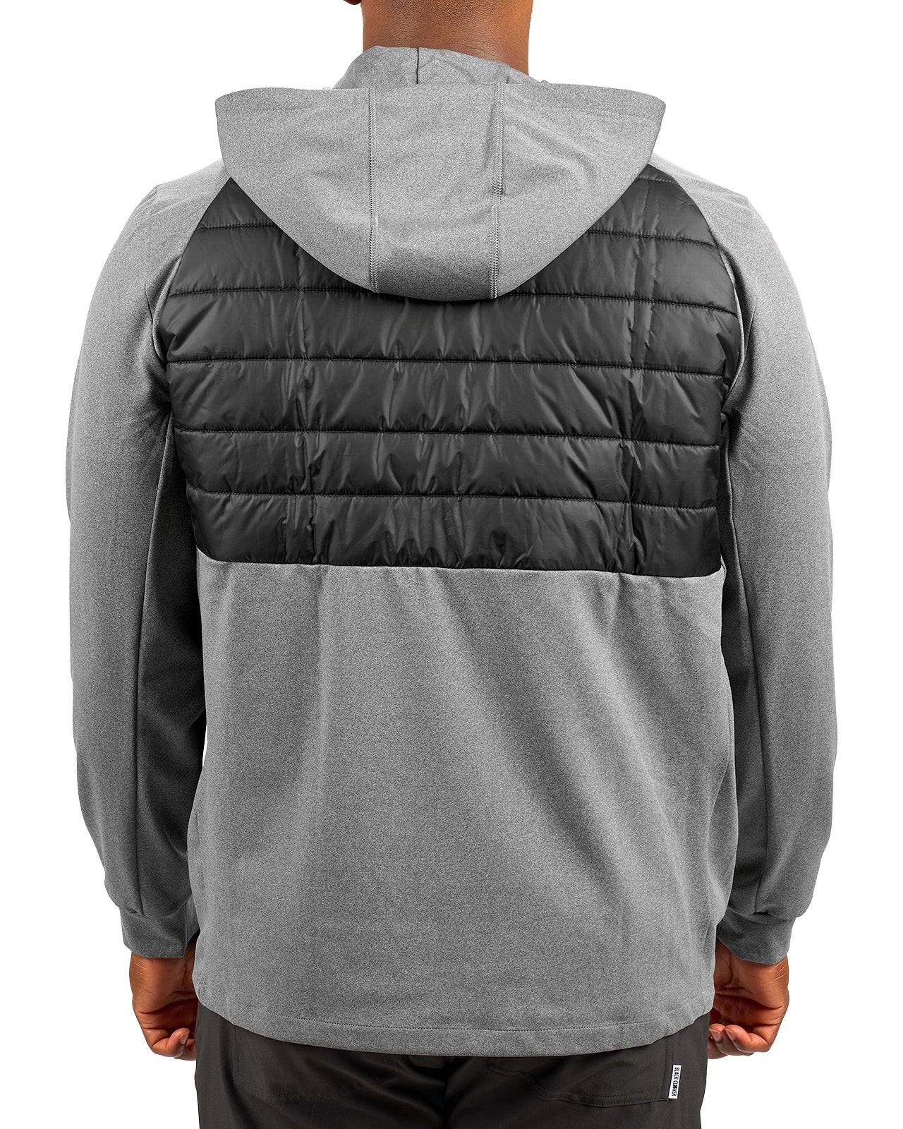 Man wearing black quilted jacket from Black Clover
